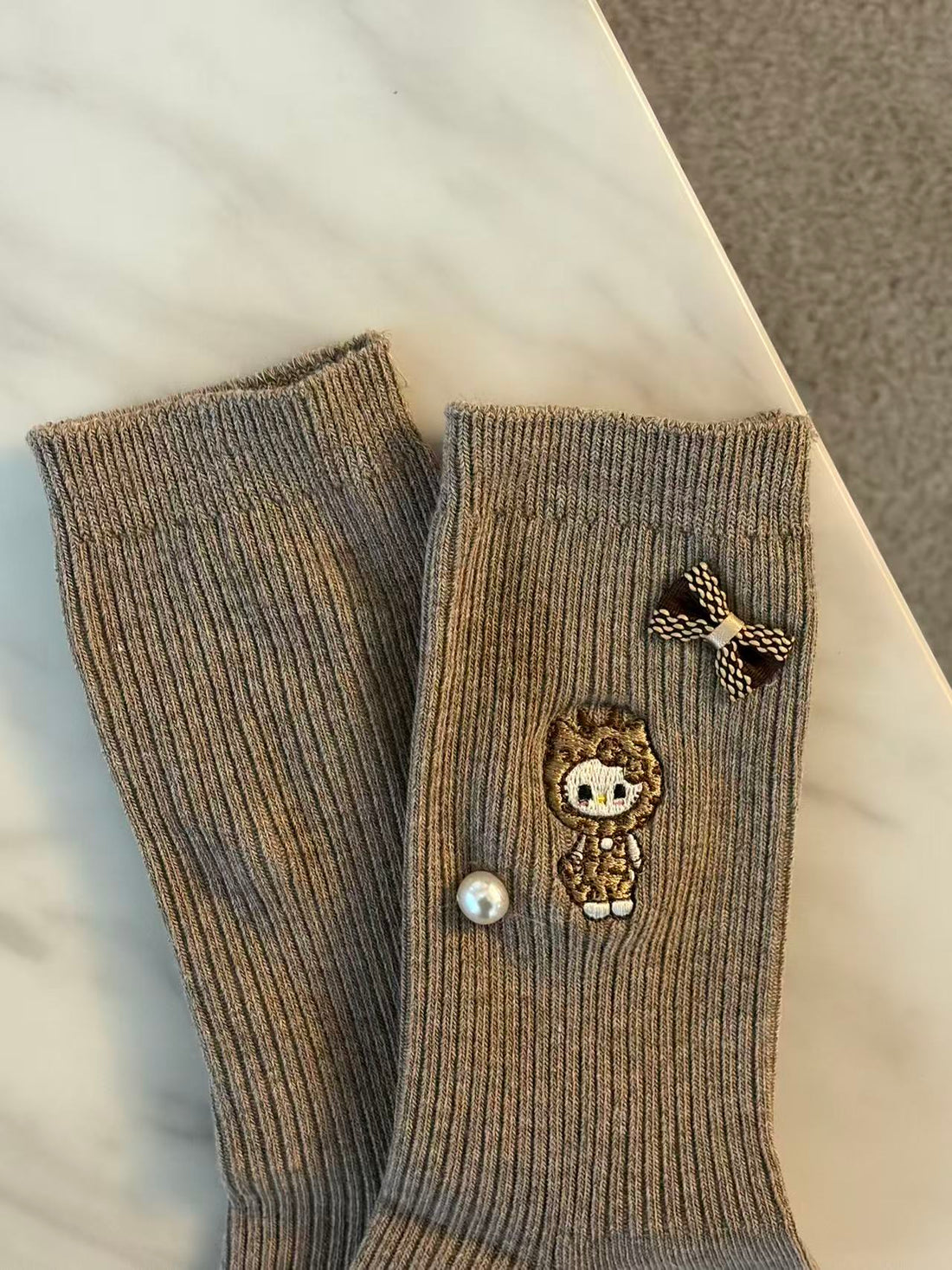 Hello Kitty® Leopard Muse Socks- Brown