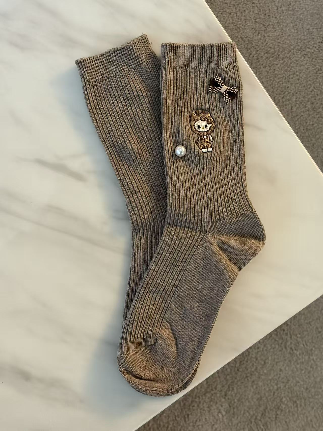 Hello Kitty® Leopard Muse Socks- Brown